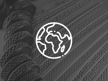 Earth globe icon over 3D printed Celtic pattern texture rollers in a row