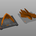 Slicer screenshot of Ekko Firelighter Mask Arcane STL parts on Prusa virtual print bed with green organic support structures shown