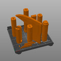 Slicer screenshot of the dwarven warrior Axes Collection - epic fantasy saga STL, orange parts on Prusa print bed