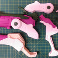 Exploded view of hero shooter game winged medic Blaster, disassembled 3D printed cosplay prop parts