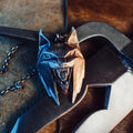 3D printed Witcher 4 Lynx medallion with metal chain on a leather surface – Witcher 4 Lynx Pendant 3D print | 3Demon