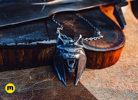 Metallic 3D printed Witcher 4 Lynx medallion on a dark wooden block – Witcher 4 Lynx Pendant 3D print | 3Demon