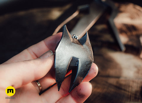 Hand holding the metallic Witcher 4 Lynx medallion showing surface texture – Witcher 4 Lynx Pendant 3D print | 3Demon