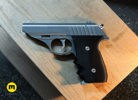 Lifestyle photo of 3D printed Grace Ashcroft Handgun Resident Evil Requiem cosplay prop pointing forward showing muzzle and frame texture detail