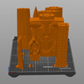the mech leader sword parts in slicer software arranged on a 3D printer heatbed for printing preparation.