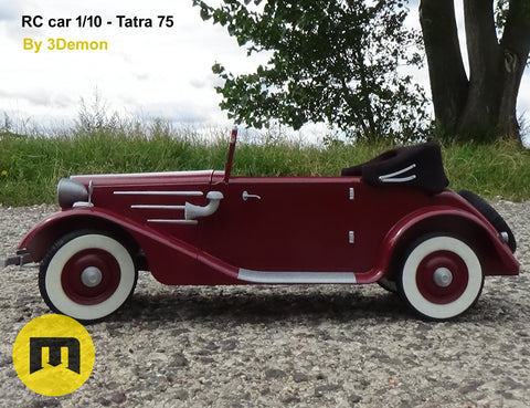 Lifestyle photo of 3D printed RC model Tatra 75, red vintage off-road car, outdoor gravel setting