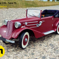 Lifestyle photo of 3D printed RC model Tatra 75, red vintage car on gravel terrain, 3D print