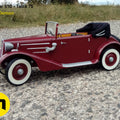 Lifestyle photo of RC model Tatra 75, red 1/10 scale car on gravel terrain, 3D printed RC car