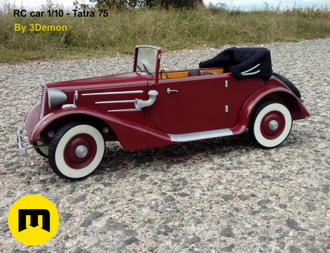Lifestyle photo of RC model Tatra 75, red 1/10 scale car on gravel terrain, 3D printed RC car