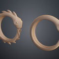 Clay render of Slay the Spire Snake Ring both variants side by side showing smooth back and sharp ridged spiked version with sculptured snake head