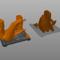 Slicer screenshot of Super shotgun - Doom The Dark Ages STL, orange parts on Prusa print bed