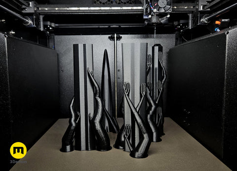 Photo of Eowyn LOTR sword guard and handle parts in tan brown filament on heated bed of Original Prusa 3D printer