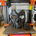 Black 3D printed the wraith king skull mask and side attachment with organic tree supports on a Prusa i3 MK3 printer bed.