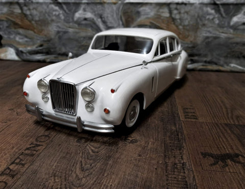 Lifestyle photo of RC model Jaguar MK8, white classic car 3D printed scale model.