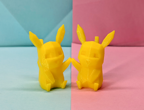 Two yellow 3D-printed Pikachu figures on a split light blue and pink background holding hands