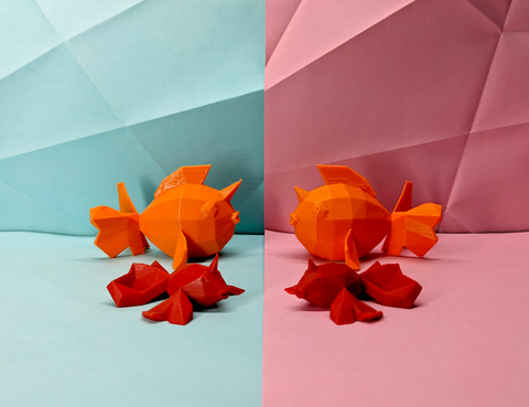 Orange low poly fish on a split background of blue and pink with geometric patterns.