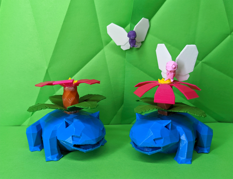 Two venusaur with pink flowers and white butterflies on a green background