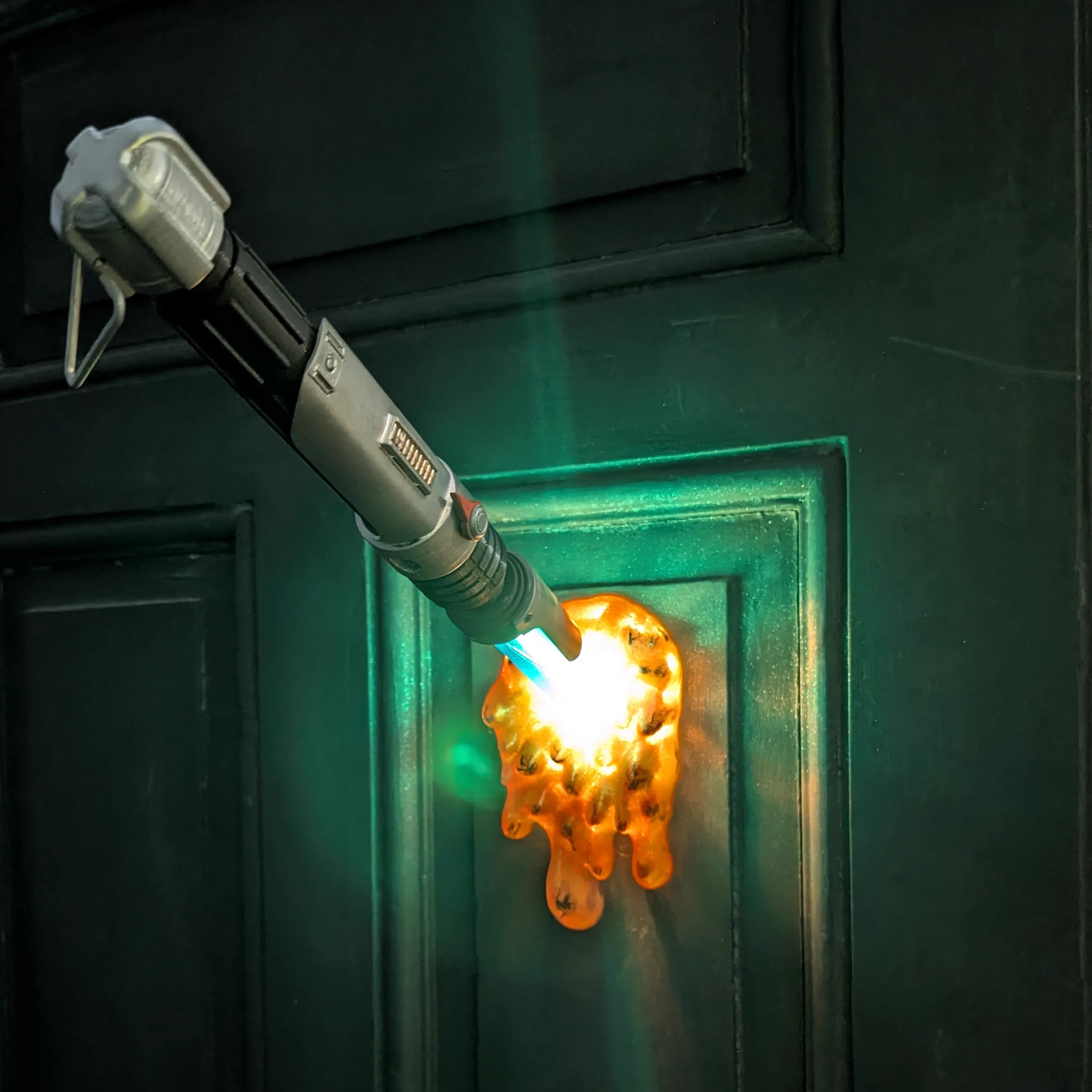 Melting wall mount for 3D printed lightsaber hilts — STL file