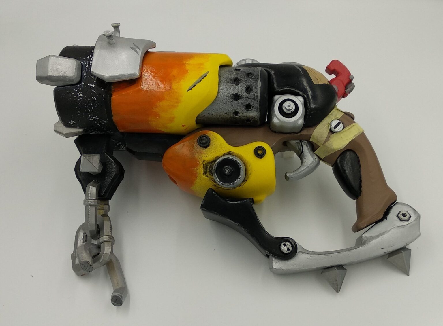 3D visualization of Roadhog scrap gun - Overwatch game, exploded view cosplay prop with orange barrel, black grip, 3D...