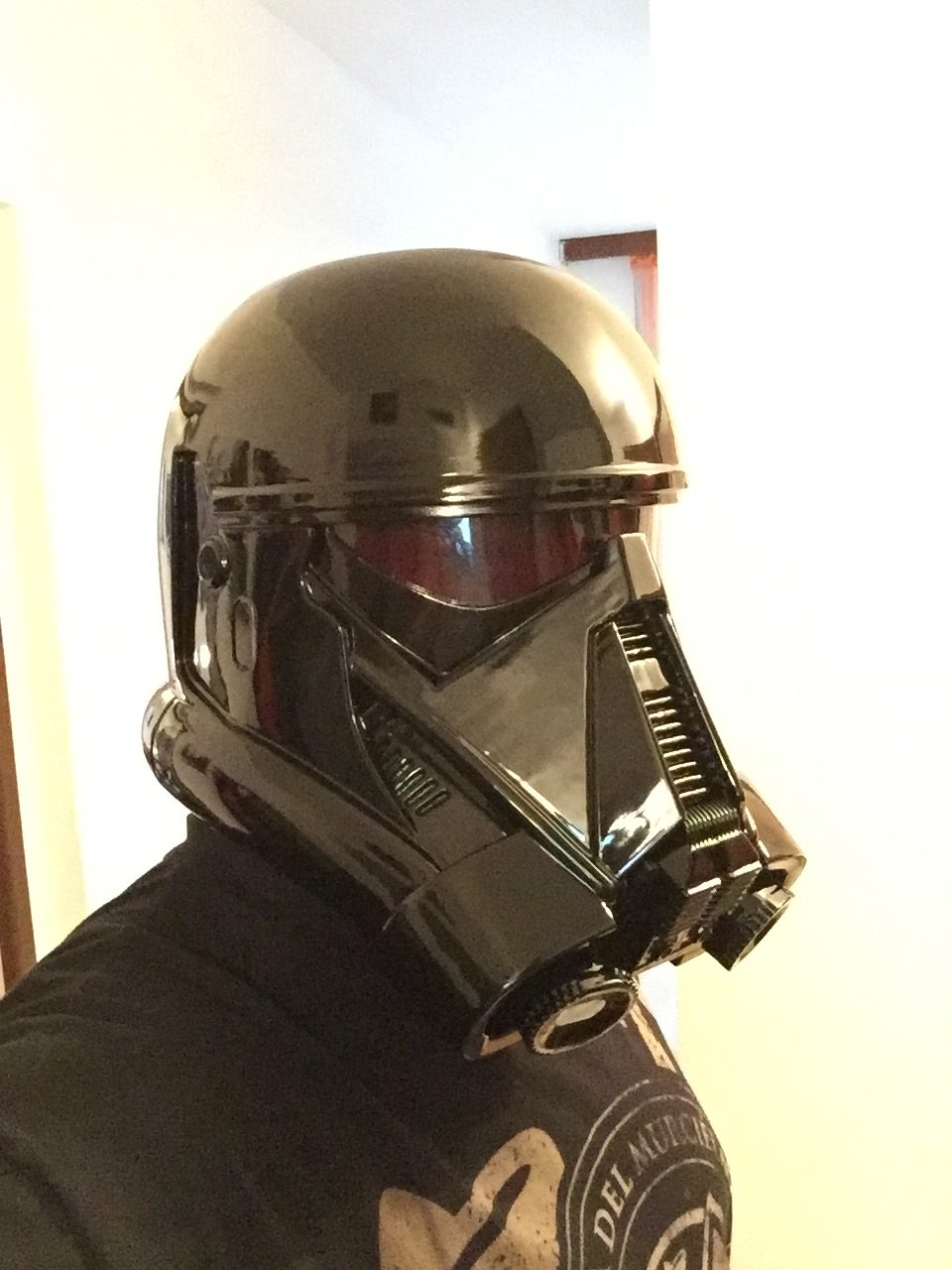 Lifestyle photo of Death Trooper helmet - Star Wars Rogue One, 3D printed cosplay prop, side view.