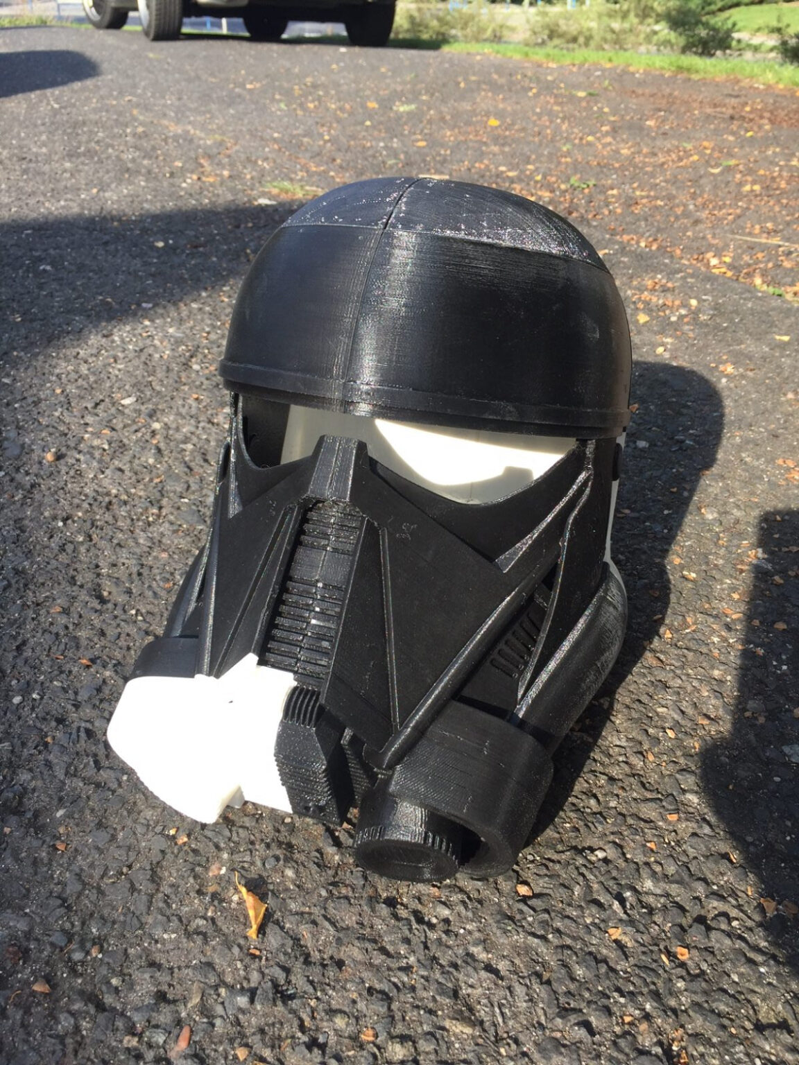 Lifestyle photo of Death Trooper helmet - Star Wars Rogue One, black 3D printed cosplay prop.