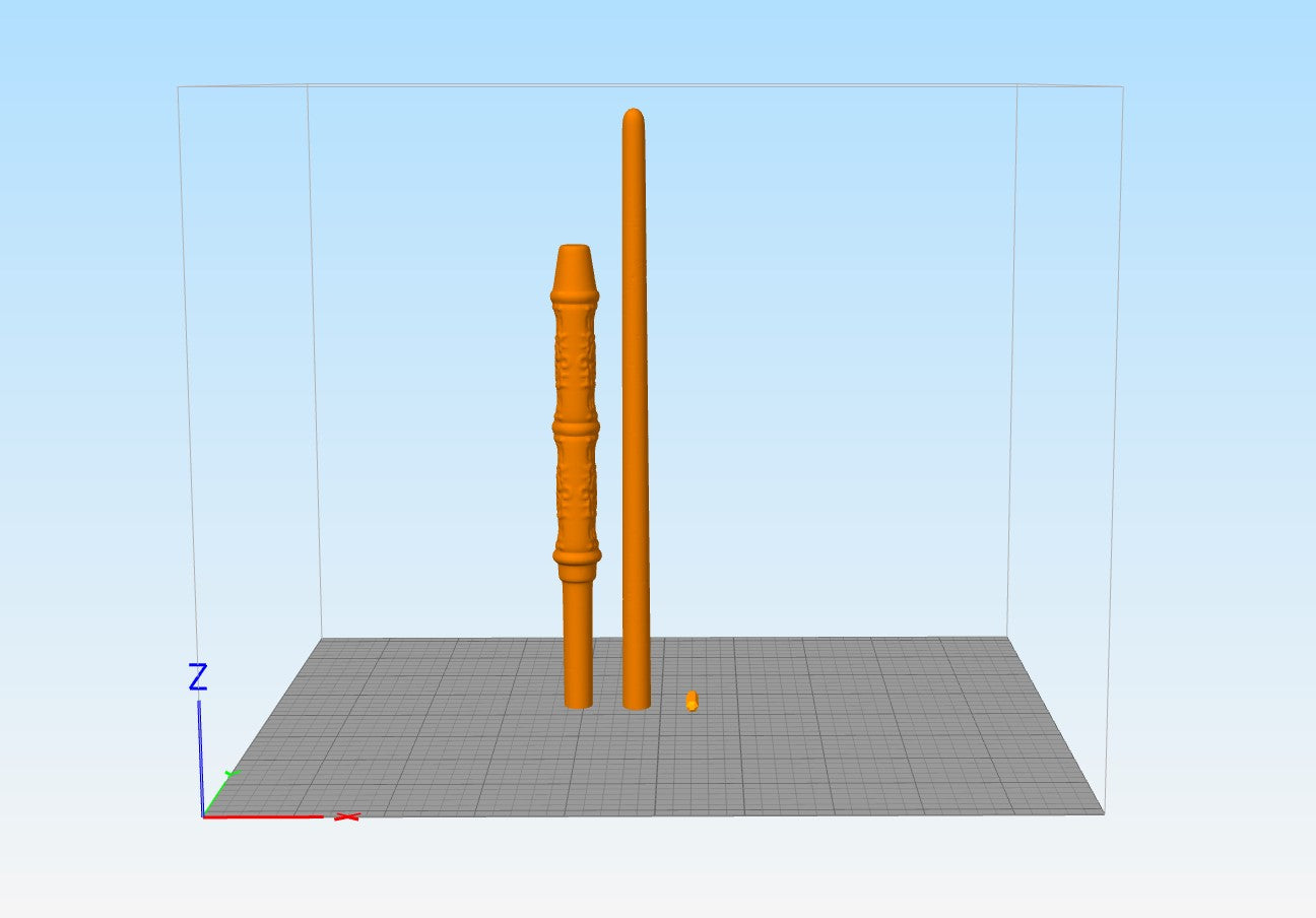 Slicer print bed layout showing split orange STL parts of Severus Snapes 3D printable wand on a virtual grid.