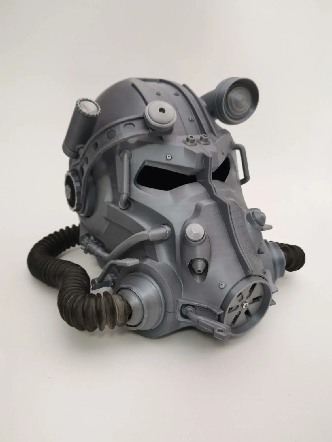 3D model render of T60 helmet from Fallout 4, detailed gray 3D print cosplay prop, side view.