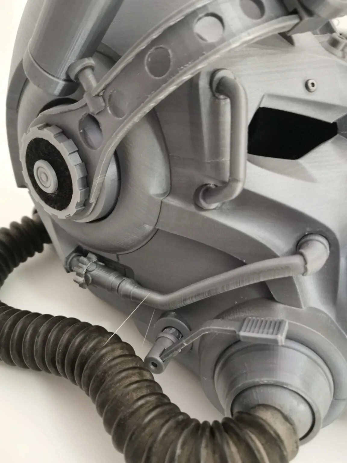 Rendered 3D model of T60 helmet from Fallout 4 STL, close-up of visor hinge and cable detail, 3D print cosplay prop