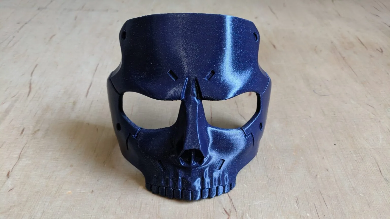 Lifestyle photo of Die-Hardman Mask - Death Stranding, matte black 3D printed cosplay prop.