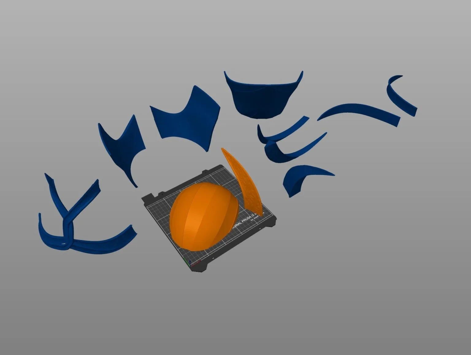 Slicer print bed layout showing split 3D printable STL parts of the Dark Mountain helmet on a virtual grid.