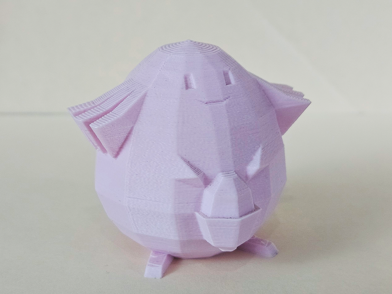 Photo of 3D printed Chansey STL collectible figure, pastel purple, rear view