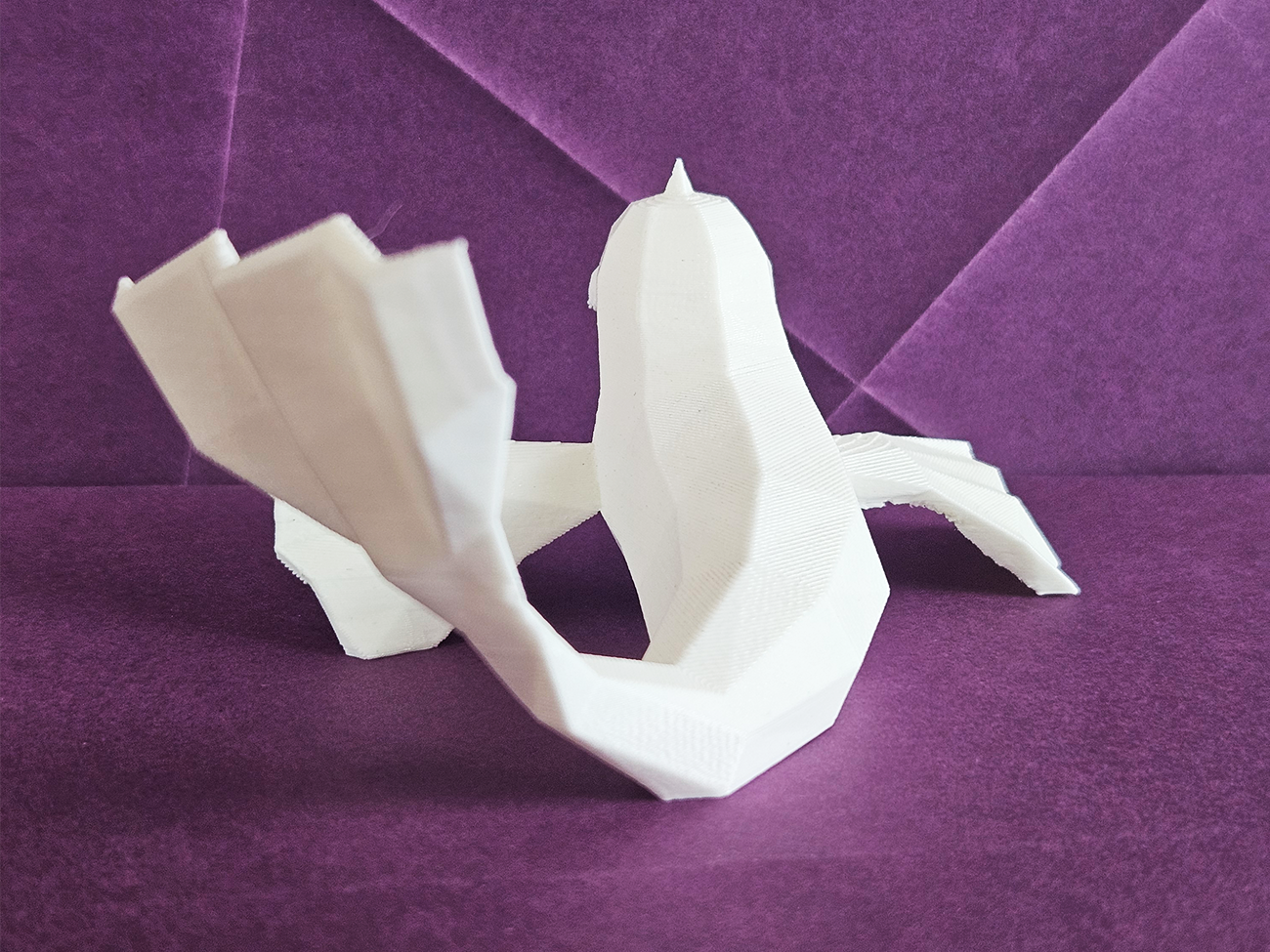 3D printed Dewgong STL collectible figure, white, dynamic side pose, plain background