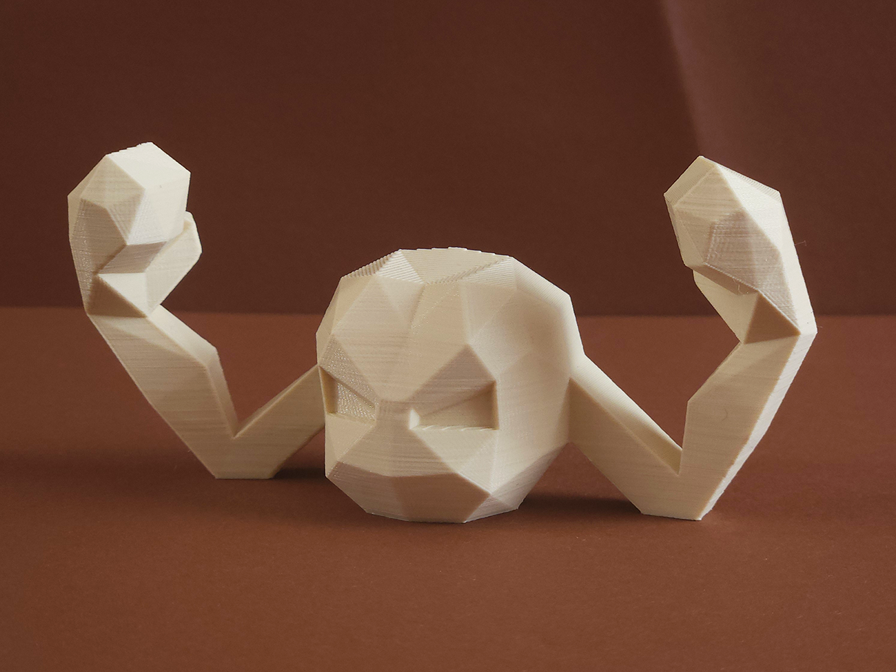 Photo of 3D printed Geodude STL collectible figure, beige polyhedral design, front pose view