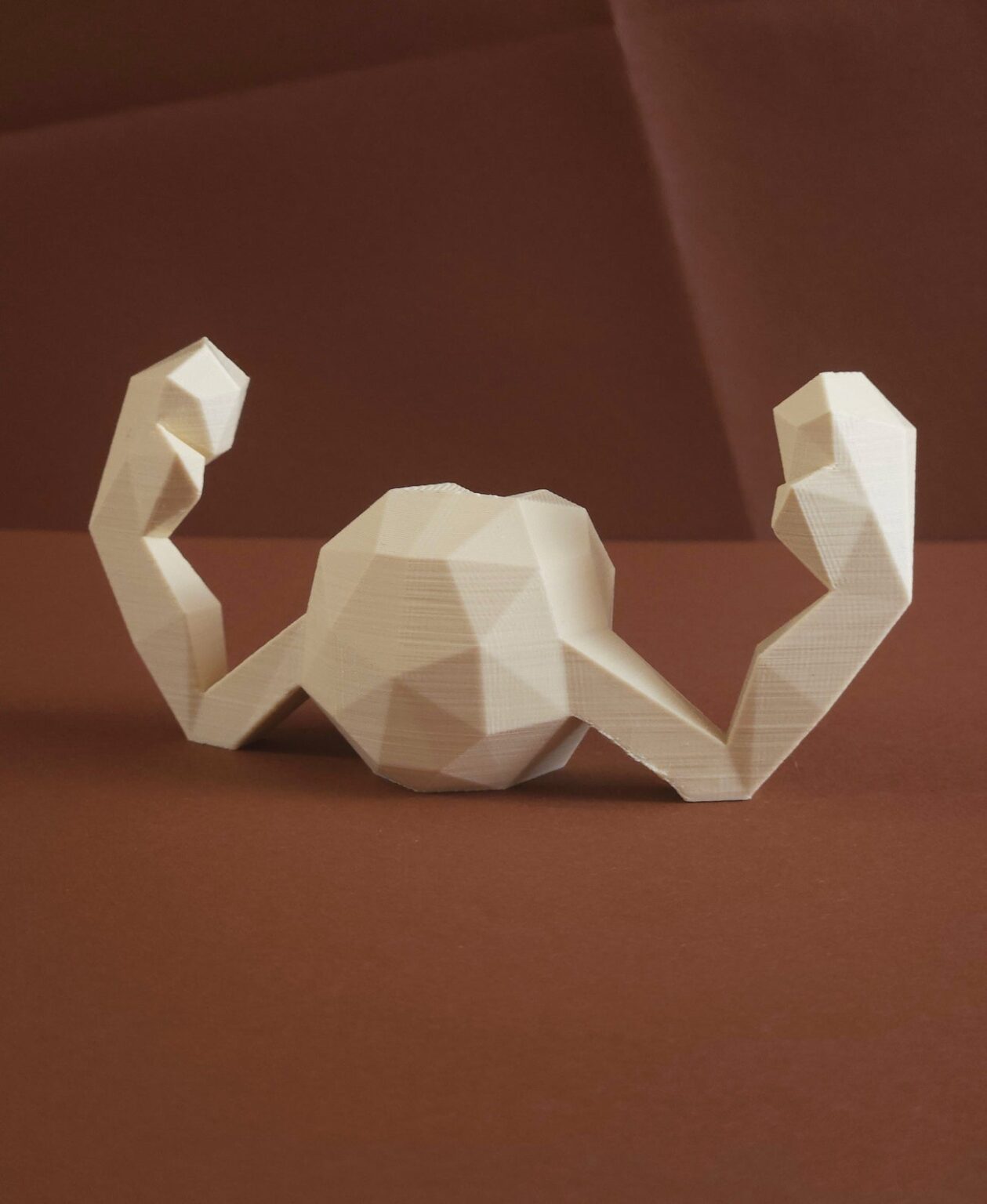 3D printed Geodude STL collectible figure, beige rocky texture, side profile view