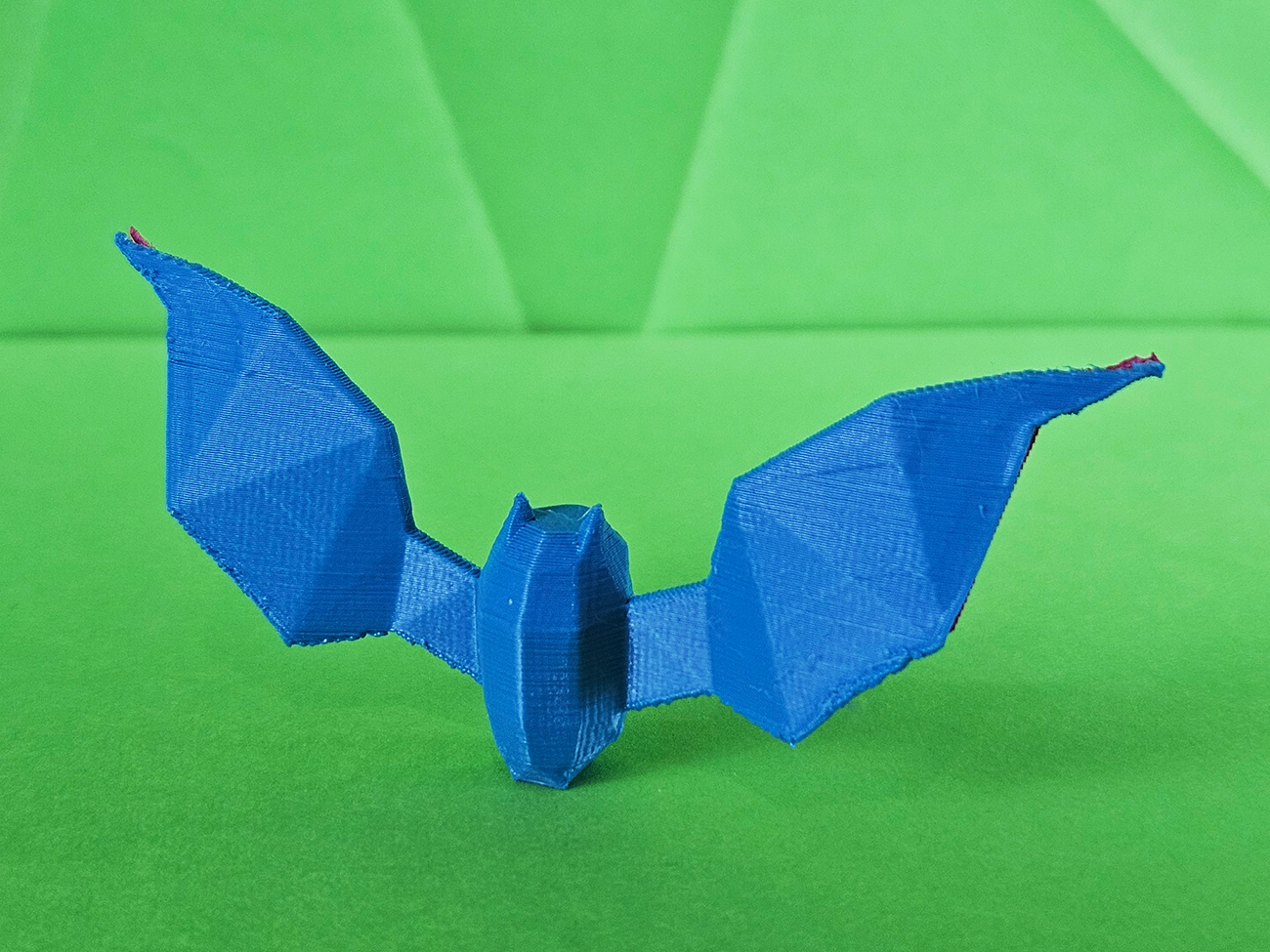 3D printed Golbat STL collectible figure, blue wings, side profile view