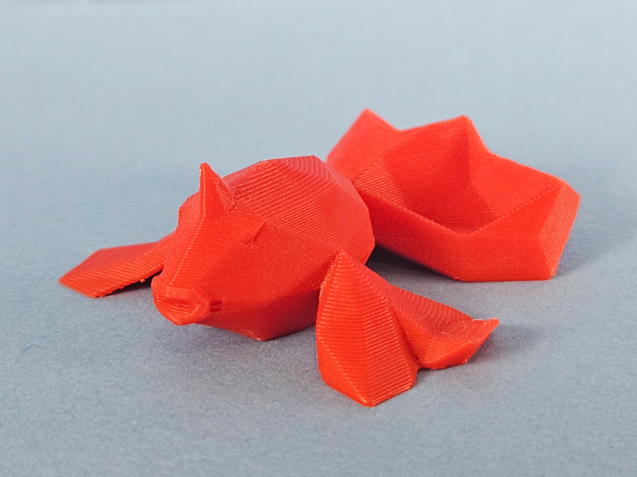 Photo of 3D printed Goldeen STL collectible figure, orange, dynamic side-angle view