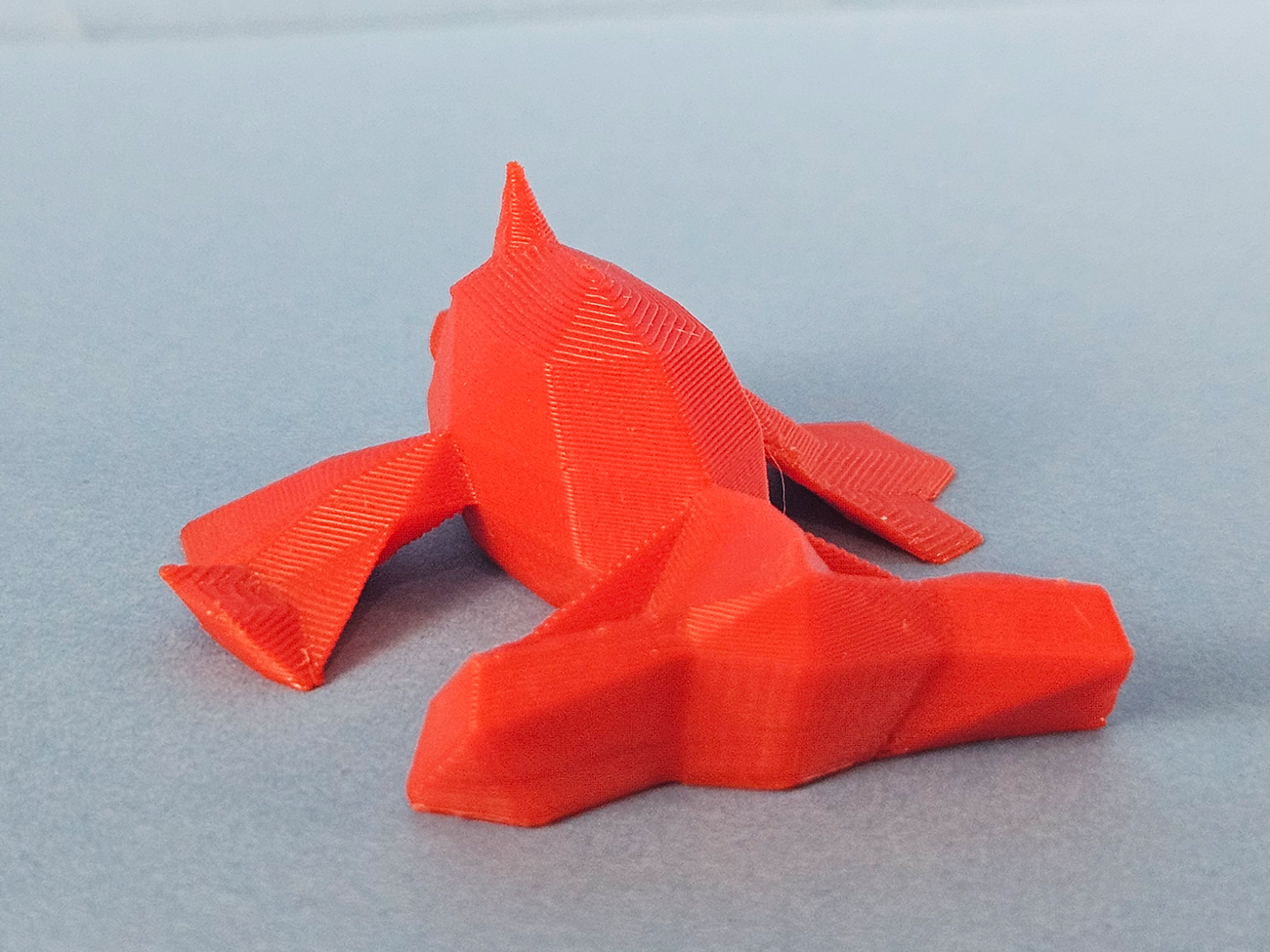 3D printed Goldeen STL collectible figure, orange, dynamic side angle view