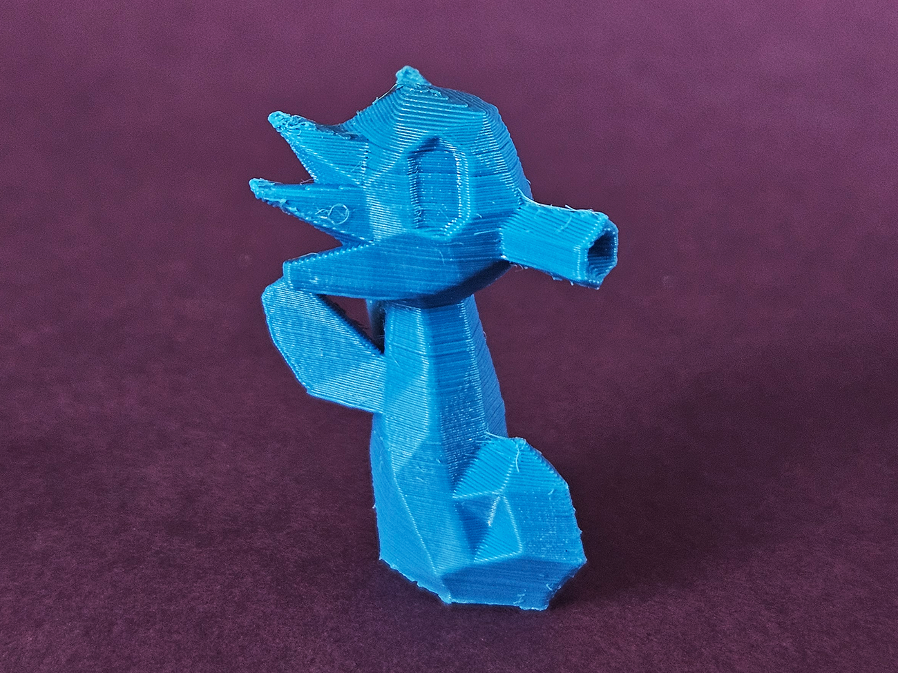 Photo of 3D printed Horsea STL collectible figure, blue, dynamic side angle view
