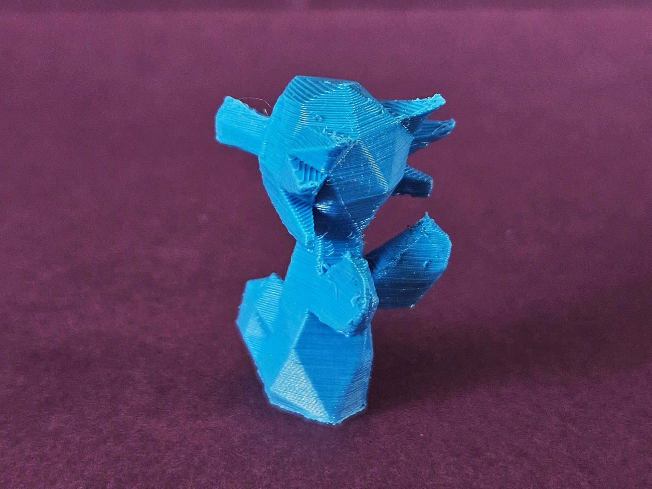 3D printed Horsea STL collectible figure, teal blue, side profile view