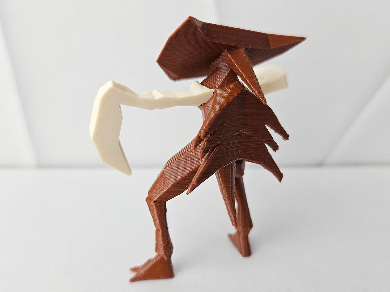 3D printed Kabutops STL collectible figure, brown/cream two-tone, dynamic action pose