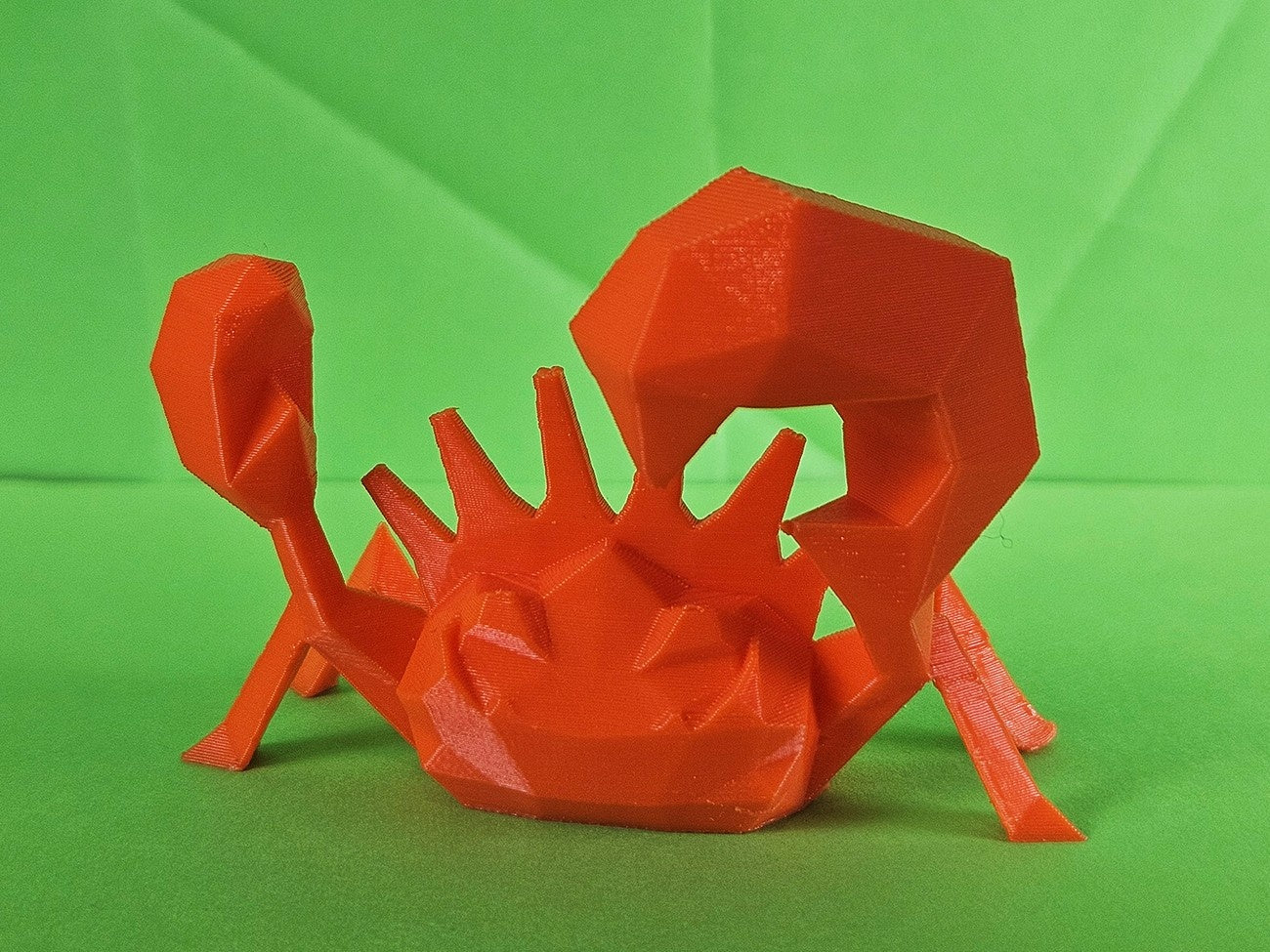 Photo of 3D printed Kingler STL collectible figure, red, front claw detail view