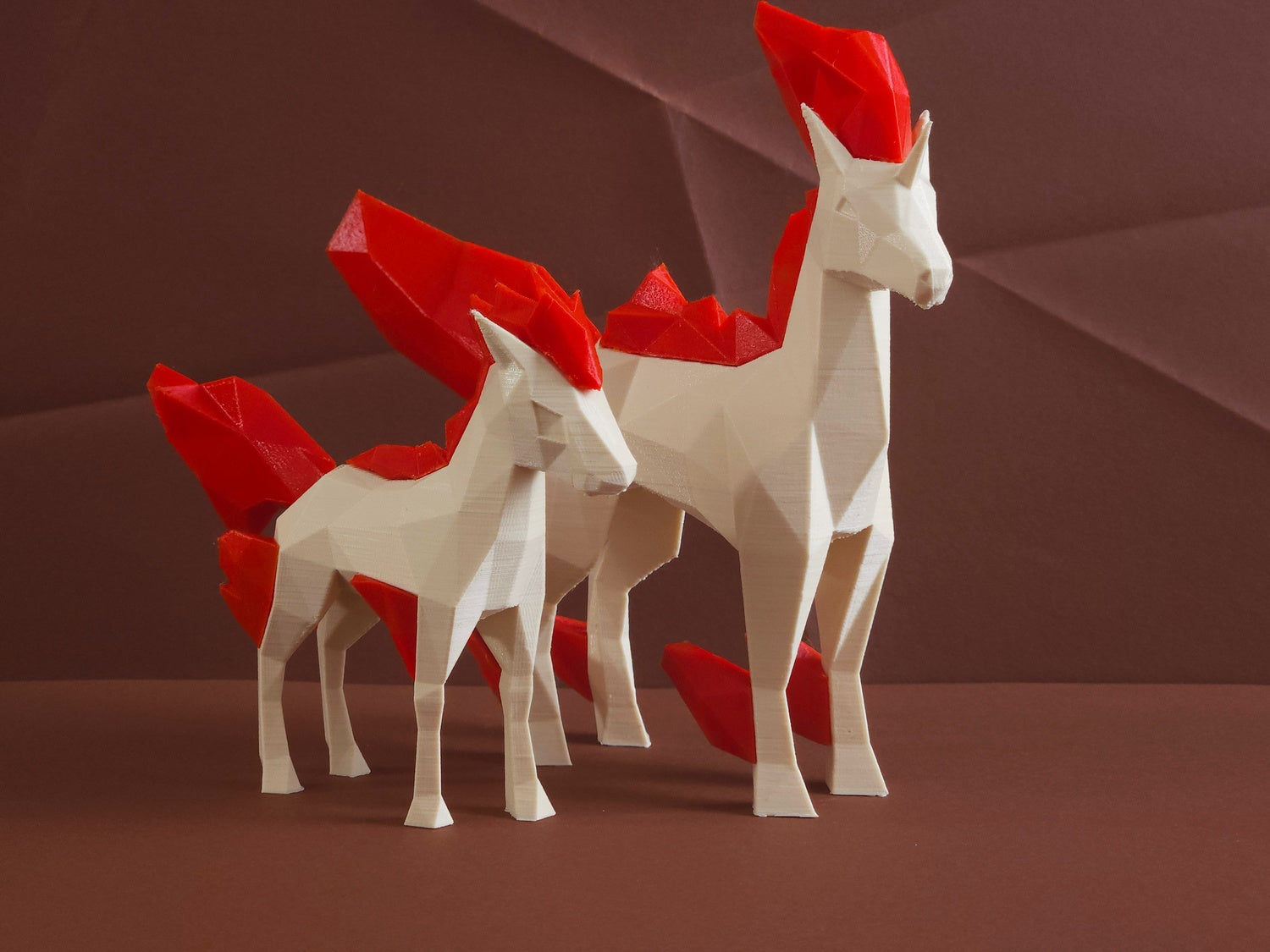 Photo of 3D printed Rapidash STL collectible figure, white/red, side-by-side view, plain background