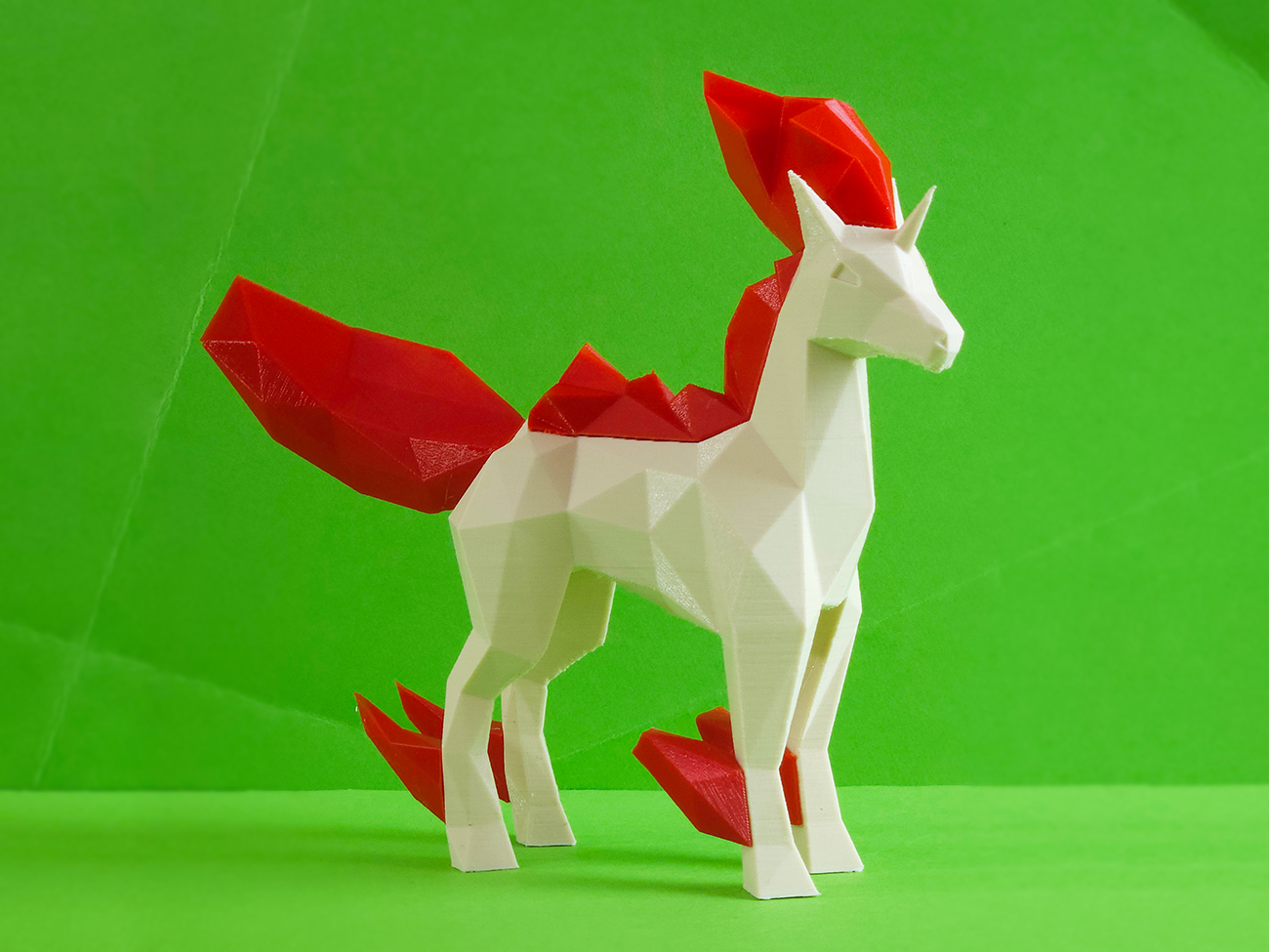 Photo of 3D printed Rapidash STL collectible figure, white & red, dynamic side view