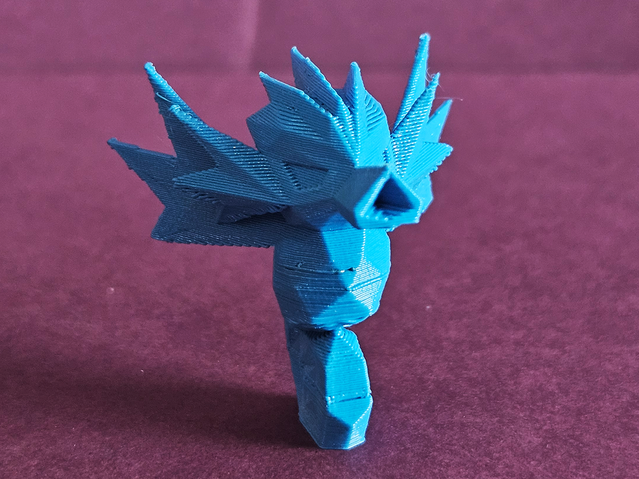 Photo of 3D printed Seadra STL collectible figure, teal blue, front angled view