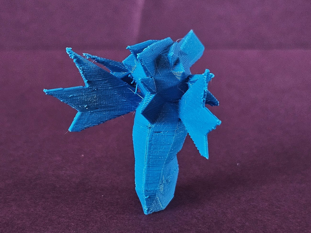 3D printed Seadra STL collectible figure, teal blue, dynamic side-front view