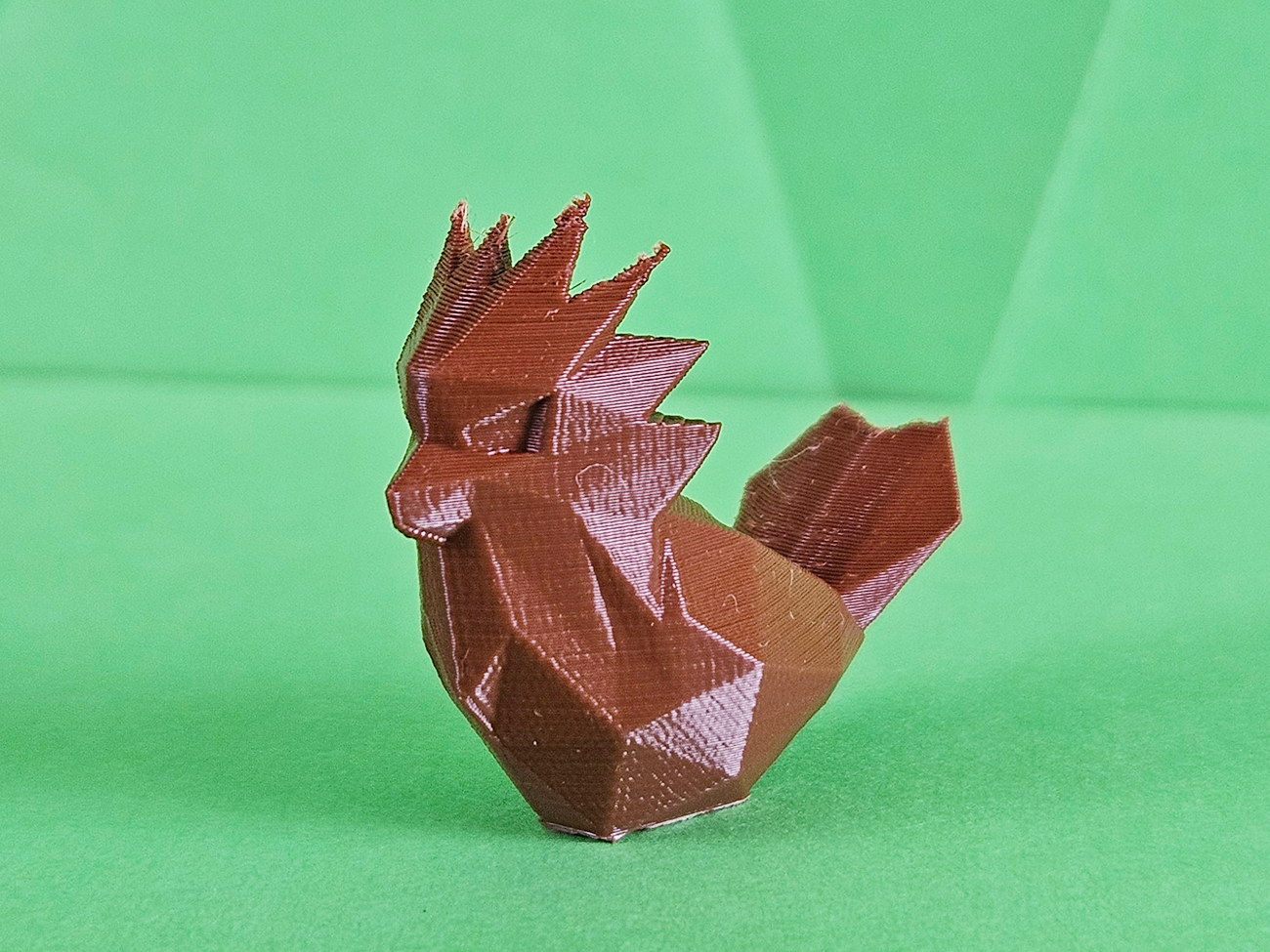 Photo of 3D printed Spearow STL collectible figure, brown feathered body, side profile view