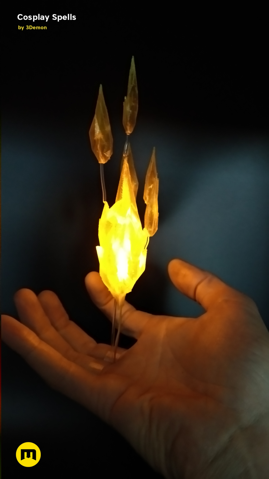 Hand photo of Cosplay Spells STL, glowing yellow wand with translucent blades, 3D printed cosplay prop.