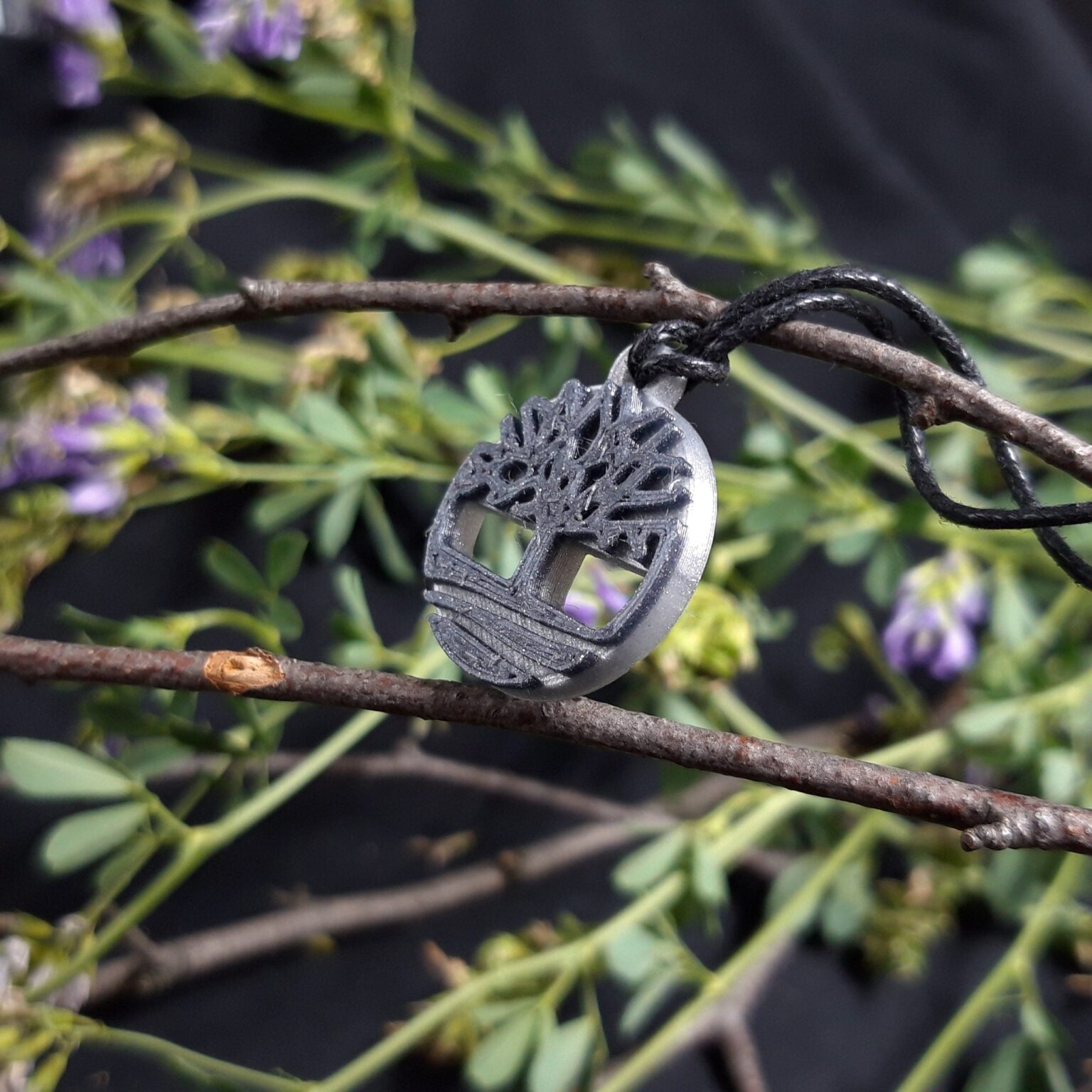 Digital 3D render of Celtic Tree Of Life Amulet, silver textured 3D print accessory.