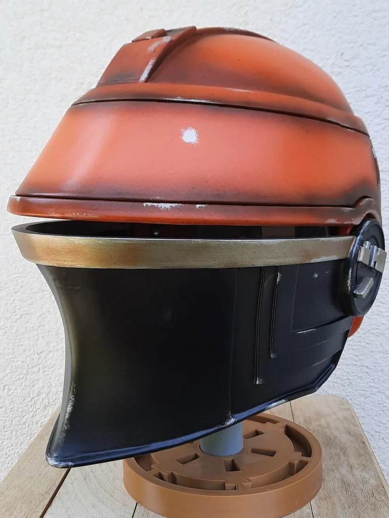 Lifestyle photo of Fennec Shand helmet, orange-brown 3D printed cosplay prop, side view