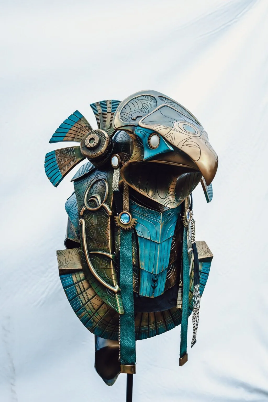 3D visualization of Horus Helmet STL, intricate blue-green armor with fan detail, 3D print cosplay prop